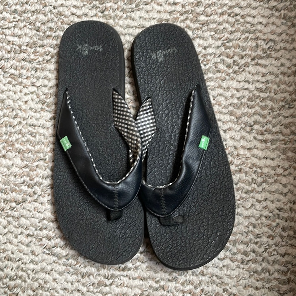 Black flip flops